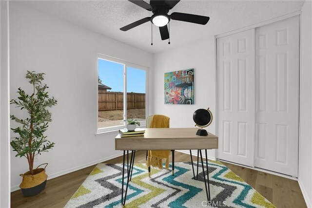 24855 Sundial Way, Moreno Valley, CA 92557 - office featuring wood finished floors, ceiling fan, and baseboards