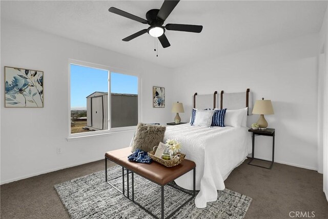 24855 Sundial Way, Moreno Valley, CA 92557 - carpeted bedroom with ceiling fan and baseboards
