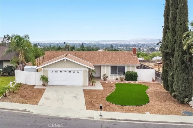 24855 Sundial Way, Moreno Valley, CA 92557 - ranch-style home with an attached garage, driveway, and a chimney