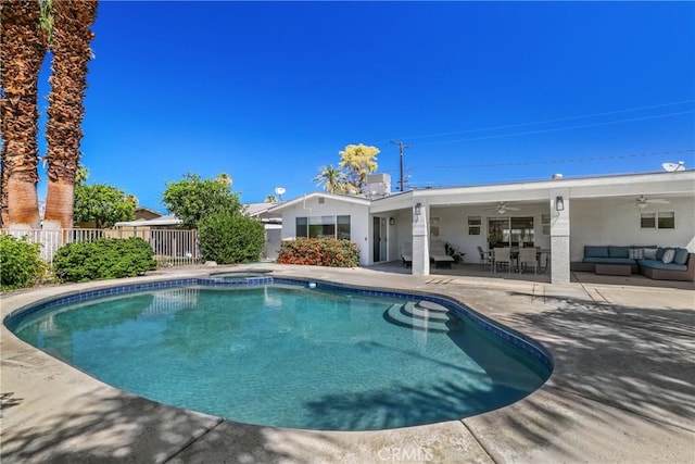 77355 Minnesota Ave, Palm Desert, CA 92211 - view of pool featuring a ceiling fan, an outdoor hangout area, a patio area, and a pool with connected hot tub