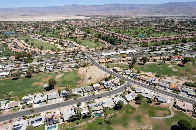 77355 Minnesota Ave, Palm Desert, CA 92211 - aerial view of property's location featuring a golf course, mountains, and nearby suburban area