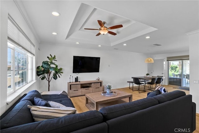 77355 Minnesota Ave, Palm Desert, CA 92211 - living area with a raised ceiling, light wood-style flooring, recessed lighting, a ceiling fan, and crown molding