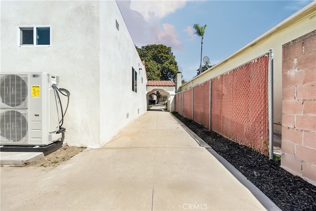 3991 Hubert Ave, Los Angeles, CA 90008 - view of home's exterior featuring a cooling unit and stucco siding