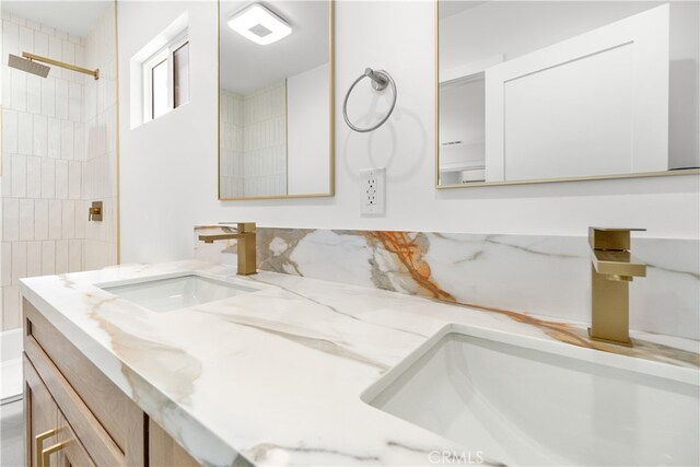 3991 Hubert Ave, Los Angeles, CA 90008 - full bathroom with double vanity, toilet, and a shower