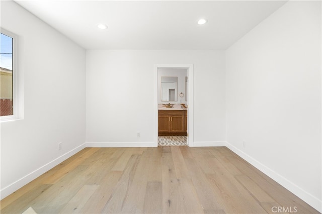 3991 Hubert Ave, Los Angeles, CA 90008 - spare room with light wood finished floors, baseboards, and recessed lighting