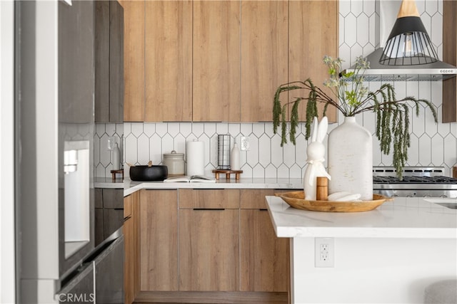 3927 Welland Ave, Los Angeles, CA 90008 - kitchen with backsplash, light countertops, modern cabinets, and brown cabinets