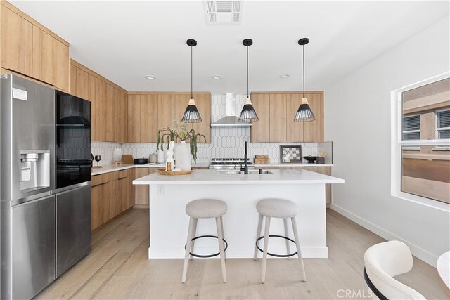3927 Welland Ave, Los Angeles, CA 90008 - kitchen featuring stainless steel refrigerator with ice dispenser, modern cabinets, light countertops, and recessed lighting