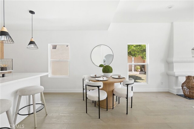 3927 Welland Ave, Los Angeles, CA 90008 - dining room with baseboards and light wood-style flooring
