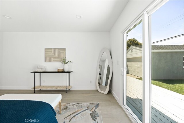 3927 Welland Ave, Los Angeles, CA 90008 - bedroom with baseboards, wood finished floors, and recessed lighting