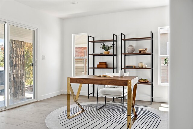 3927 Welland Ave, Los Angeles, CA 90008 - home office with wood finished floors and baseboards