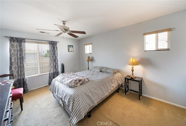 29183 Paperflower Ln, Menifee, CA 92584 - bedroom with carpet flooring, baseboards, and ceiling fan