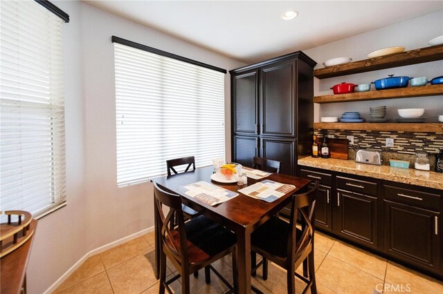 29183 Paperflower Ln, Menifee, CA 92584 - dining space with light tile patterned flooring and baseboards