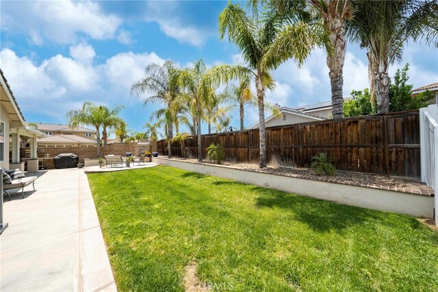 29183 Paperflower Ln, Menifee, CA 92584 - view of yard featuring a patio area