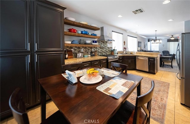 29183 Paperflower Ln, Menifee, CA 92584 - dining room featuring light tile patterned flooring, recessed lighting, a chandelier, and crown molding