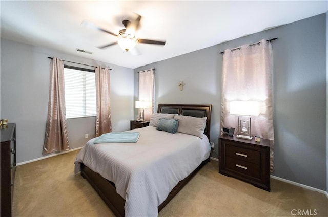 29183 Paperflower Ln, Menifee, CA 92584 - bedroom with light carpet, baseboards, and ceiling fan