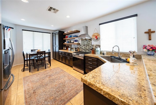 29183 Paperflower Ln, Menifee, CA 92584 - kitchen featuring appliances with stainless steel finishes, island range hood, a sink, light tile patterned floors, and recessed lighting