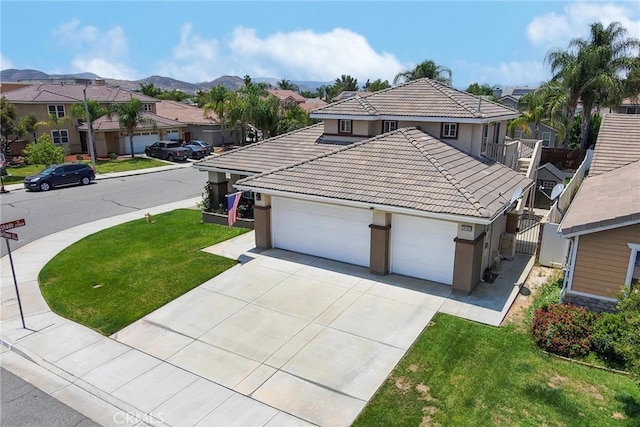29183 Paperflower Ln, Menifee, CA 92584 - view of front of property with a tiled roof, stucco siding, a residential view, driveway, and a garage