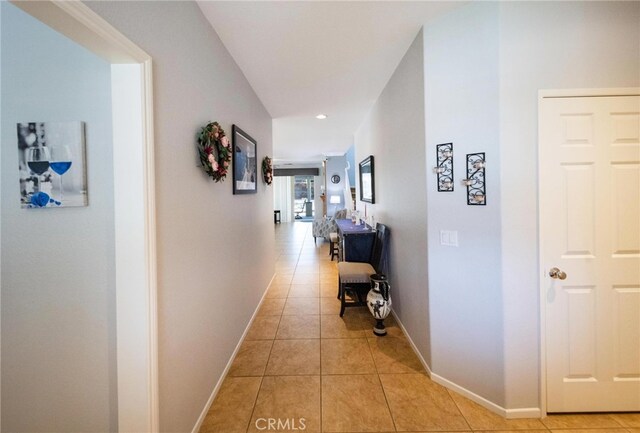 29183 Paperflower Ln, Menifee, CA 92584 - hall featuring light tile patterned flooring, baseboards, and recessed lighting
