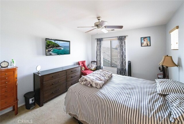 29183 Paperflower Ln, Menifee, CA 92584 - bedroom with multiple windows, light carpet, and a ceiling fan