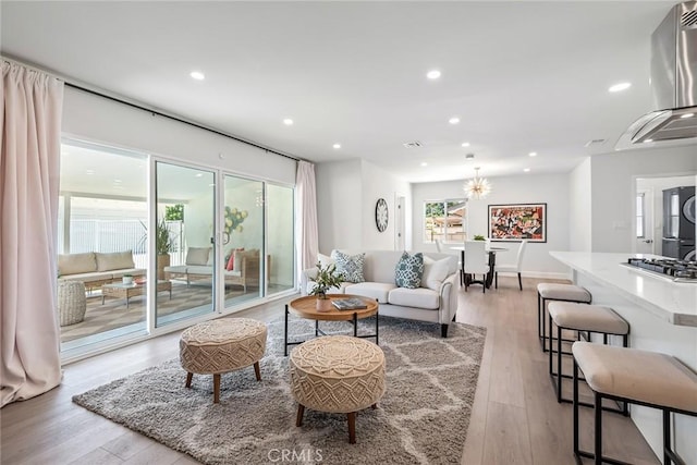 2116 E Thackery St, West Covina, CA 91791 - living room featuring light wood-type flooring and recessed lighting