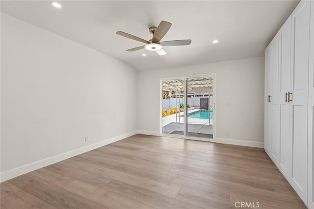 2116 E Thackery St, West Covina, CA 91791 - unfurnished bedroom featuring access to outside, baseboards, light wood-type flooring, recessed lighting, and a ceiling fan