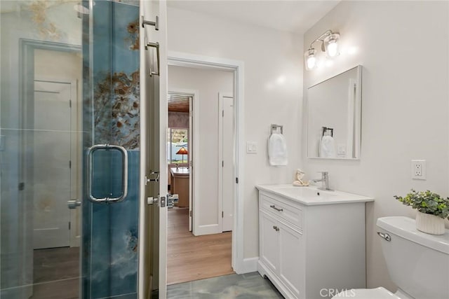 2116 E Thackery St, West Covina, CA 91791 - full bathroom featuring vanity, toilet, a shower stall, and baseboards