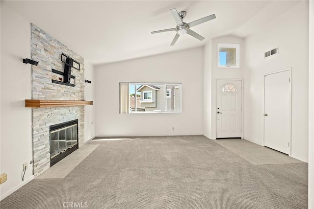 549 Springbrook N, Irvine, CA 92614 - unfurnished living room featuring carpet floors, a ceiling fan, a fireplace, and high vaulted ceiling