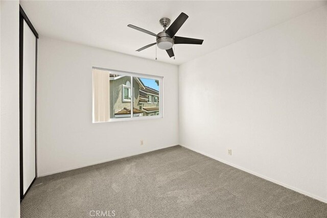 549 Springbrook N, Irvine, CA 92614 - carpeted empty room with ceiling fan and baseboards