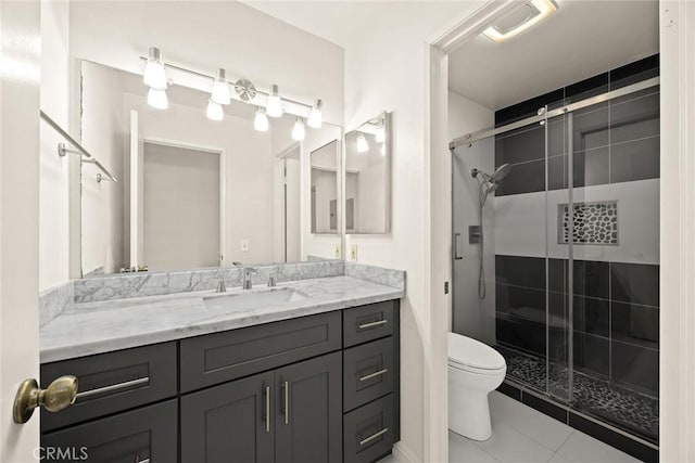 549 Springbrook N, Irvine, CA 92614 - bathroom with toilet, vanity, a stall shower, and tile patterned flooring