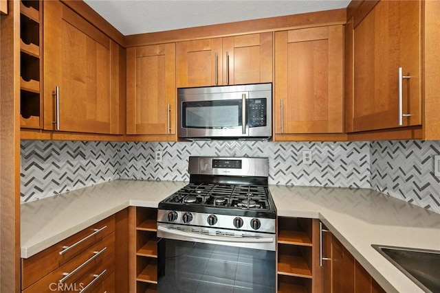 549 Springbrook N, Irvine, CA 92614 - kitchen featuring appliances with stainless steel finishes, open shelves, light countertops, and brown cabinets