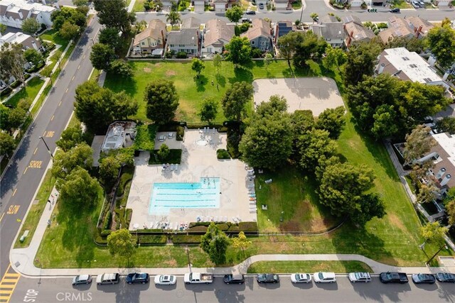 549 Springbrook N, Irvine, CA 92614 - aerial view of property and surrounding area featuring a pool area and nearby suburban area