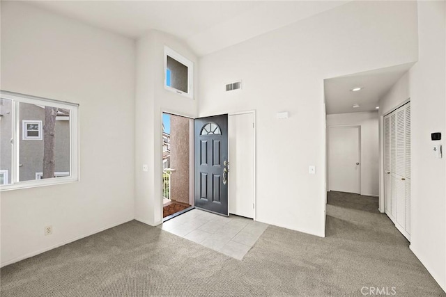 549 Springbrook N, Irvine, CA 92614 - carpeted foyer entrance with high vaulted ceiling and tile patterned floors