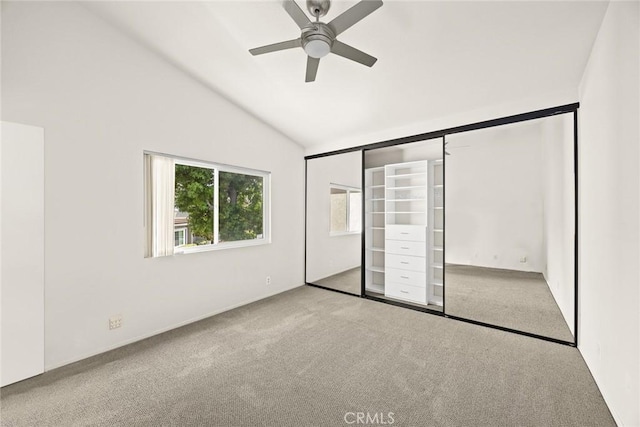 549 Springbrook N, Irvine, CA 92614 - unfurnished bedroom featuring carpet, high vaulted ceiling, and a ceiling fan
