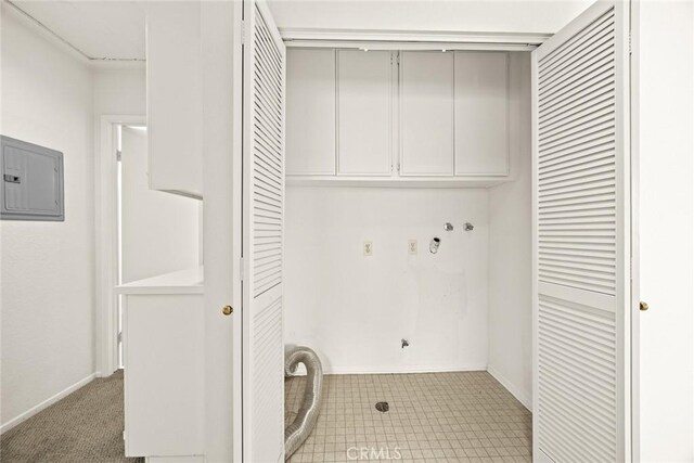 549 Springbrook N, Irvine, CA 92614 - laundry area with electric panel, hookup for a washing machine, cabinet space, and baseboards