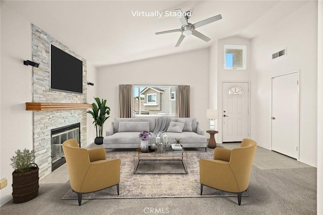 549 Springbrook N, Irvine, CA 92614 - tiled living room with ceiling fan, high vaulted ceiling, and a fireplace