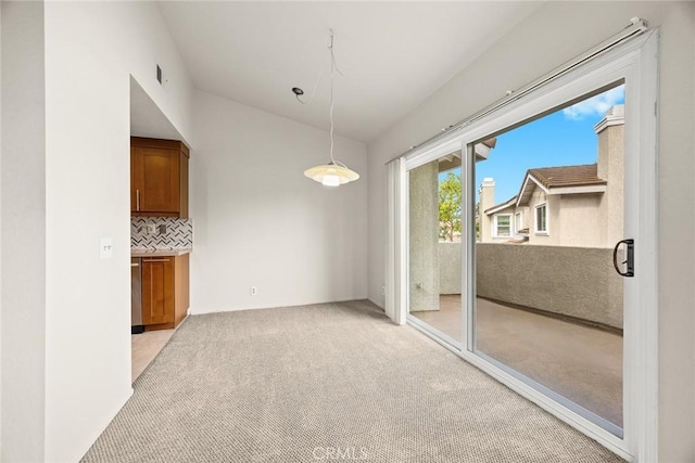549 Springbrook N, Irvine, CA 92614 - unfurnished dining area featuring light colored carpet