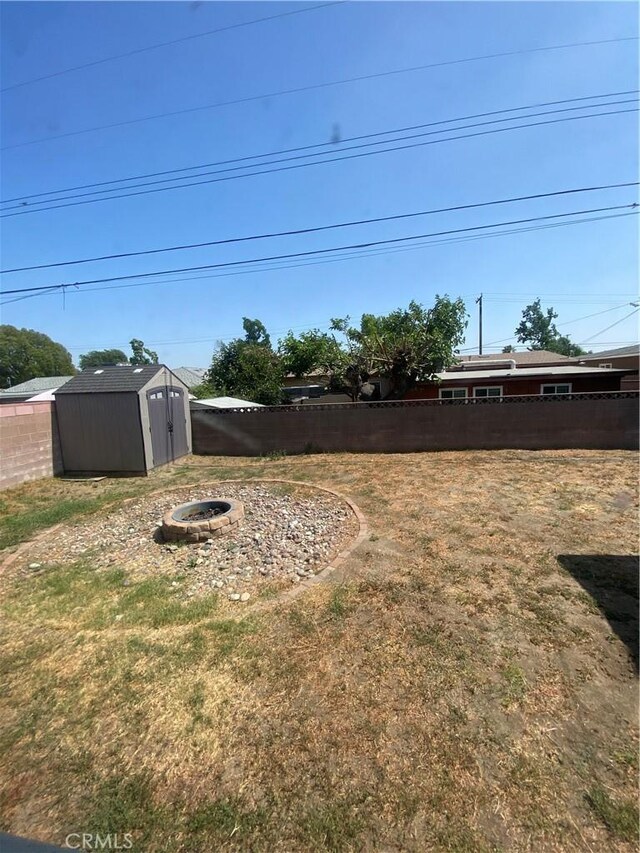 1134 E Highland Ct, Ontario, CA 91764 - view of yard featuring an outdoor fire pit