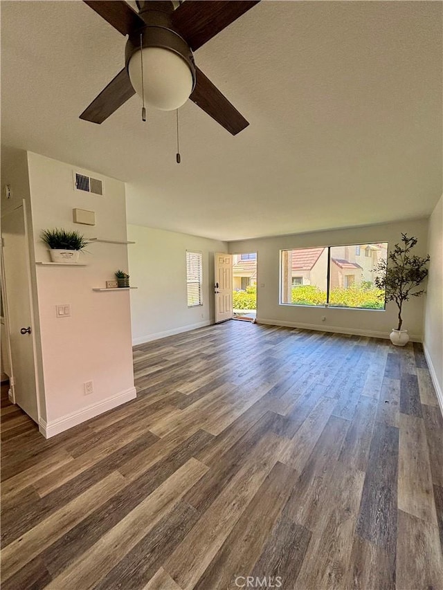 113 Pearl Unit 106, Laguna Niguel, CA 92677 - empty room featuring dark wood-style flooring, baseboards, and a ceiling fan