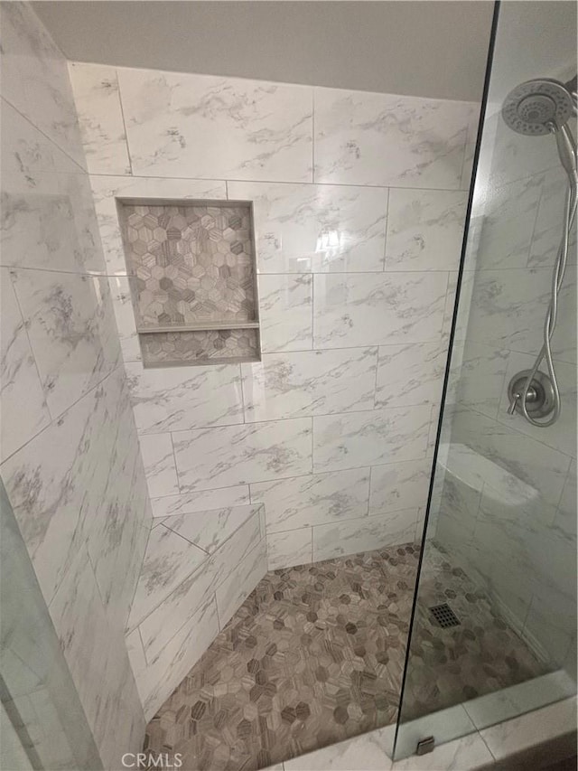 113 Pearl Unit 106, Laguna Niguel, CA 92677 - full bathroom featuring a tile shower
