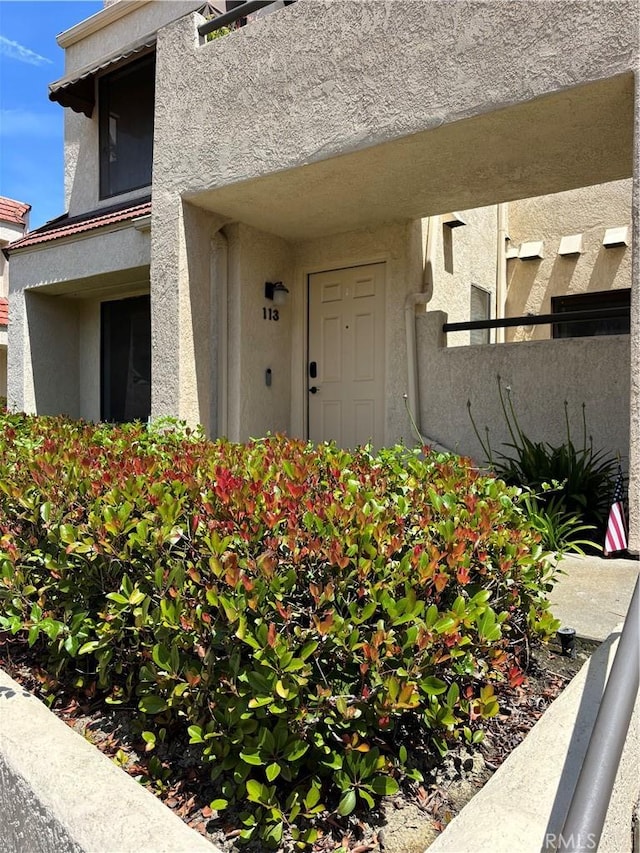 113 Pearl Unit 106, Laguna Niguel, CA 92677 - property entrance featuring stucco siding