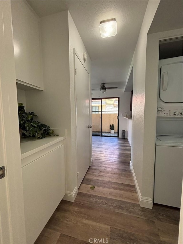 113 Pearl Unit 106, Laguna Niguel, CA 92677 - hallway with stacked washer / drying machine, dark wood-style floors, and baseboards