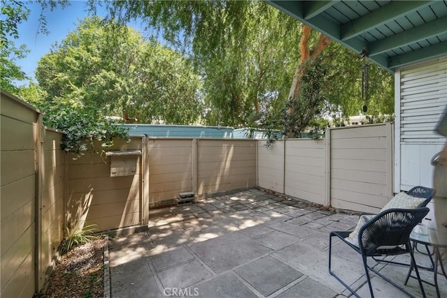 5179 Village, Los Angeles, CA 90016 - fenced backyard with a patio