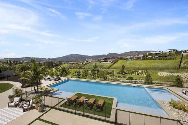 16429 Crescent Creek Dr, San Diego, CA 92127 - view of swimming pool with a patio, a mountain view, and a pool with connected hot tub