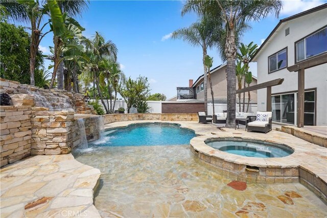 25585 Chrisanta Dr, Mission Viejo, CA 92691 - view of pool with a patio, a fenced backyard, and a pool with connected hot tub