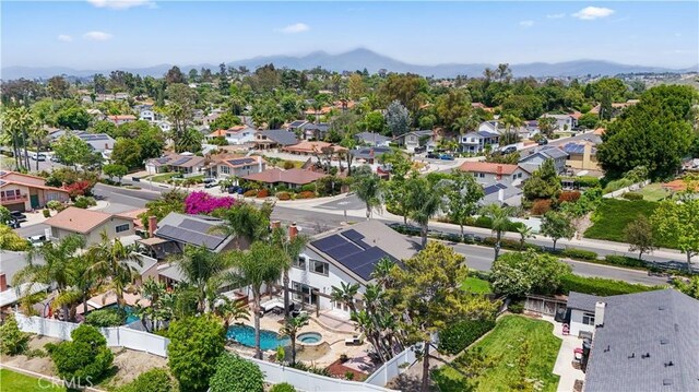 25585 Chrisanta Dr, Mission Viejo, CA 92691 - aerial view of residential area featuring a mountainous background and a pool
