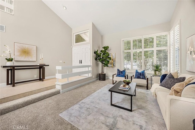 45 Colonial, Irvine, CA 92620 - living room featuring carpet flooring, baseboards, and high vaulted ceiling