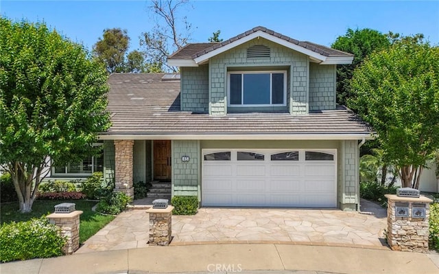 45 Colonial, Irvine, CA 92620 - view of front facade with driveway and an attached garage