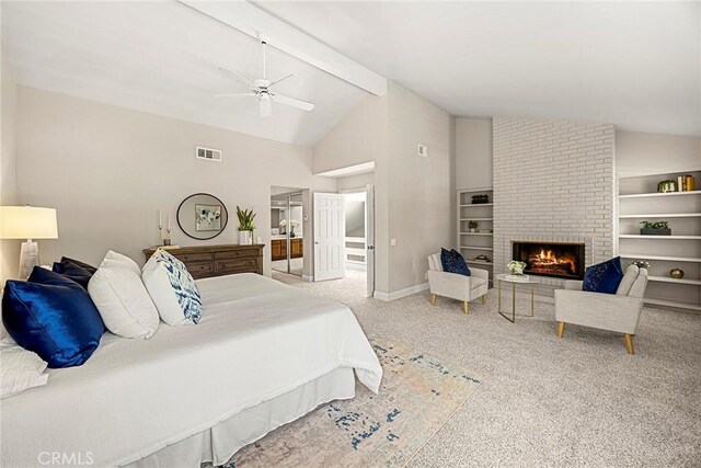 45 Colonial, Irvine, CA 92620 - bedroom with a brick fireplace, carpet flooring, beamed ceiling, ceiling fan, and baseboards
