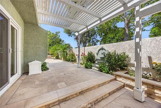 45 Colonial, Irvine, CA 92620 - fenced backyard featuring a patio area and a pergola