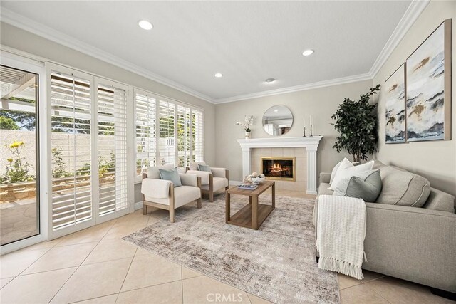 45 Colonial, Irvine, CA 92620 - living area with light tile patterned floors, a fireplace, ornamental molding, and recessed lighting